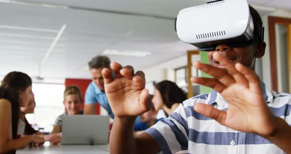 Schoolboy using virtual reality headset 4k alt