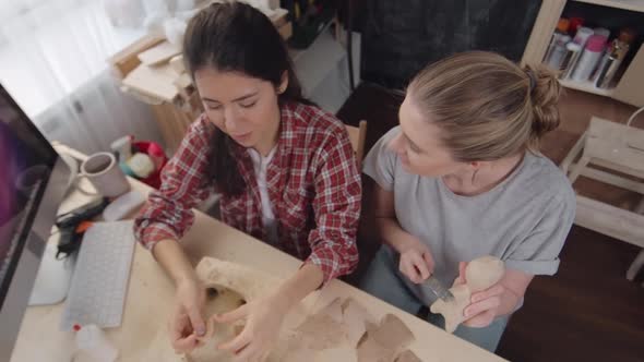 Women Creating Papier-Mache Figures alt
