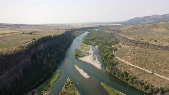Aerial View Of River With Natural Landscape From Above In Idaho. alt