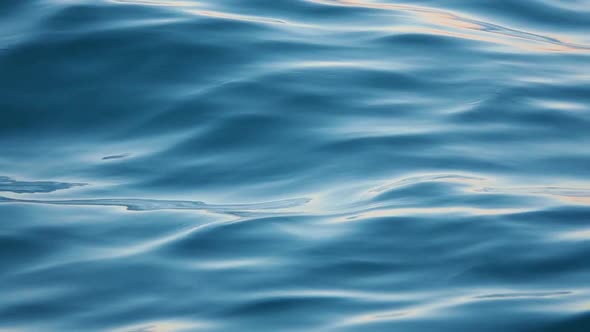 Close Up of Disturbed Blue Ocean Water Surface. Slow Motion, Stock Footage