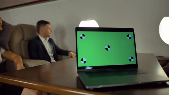 Ready for Tracking Green Screen Laptop on Private Jet Board alt