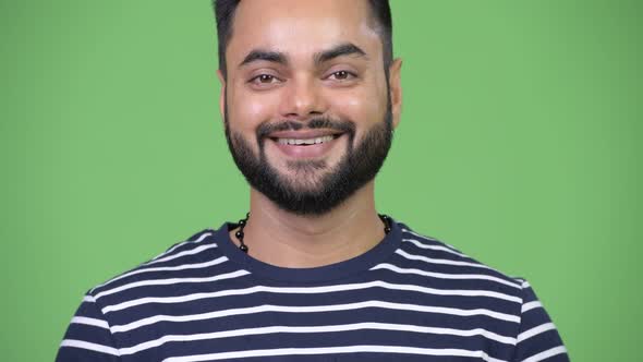 Young Happy Bearded Indian Man Smiling