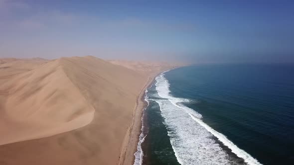 Sandwich Harbour in Namibia at the Coast of the Atlantic Ocean