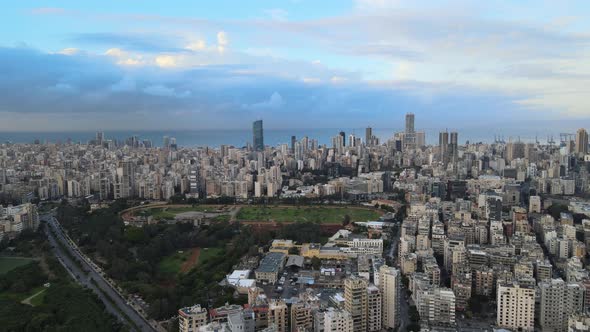 Drone Shot - Flyover Beirut with Beirut Port and explosion site in the background