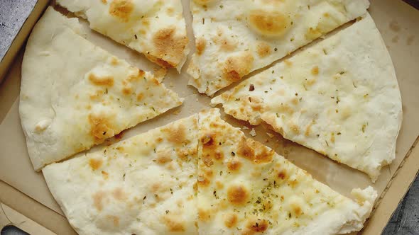 Delicious Fried Focaccia with Oregano and Olive Oil Closeup alt