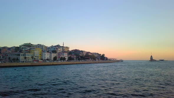 Istanbul, Turkey - ; Panning shot view of city during sunset time with sea waves .View of Istanbul c alt