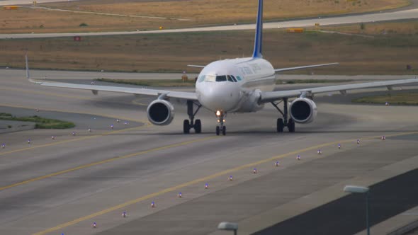 Jet Airplane Taxiing at Airport