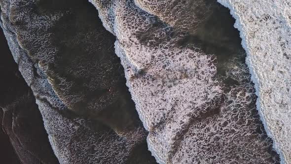 White Waves Rolling Towards Seashore Of Olon Beach In Ecuador. - Aerial Topdown Shot alt