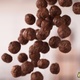 Handful of Falling Chocolate Ball-Shaped Cereals - VideoHive Item for Sale