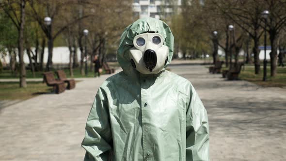 Close-up Portrait of a Man in a Protective Suit on the Street
