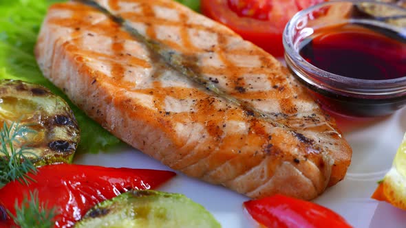 Grilled Salmon Fish Steak Served with Vegetables Seafood Concept