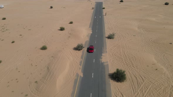 Sport Car Driving on a Desert Road