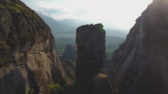 Flying over Meteora rock formations and monasteries in Greece alt