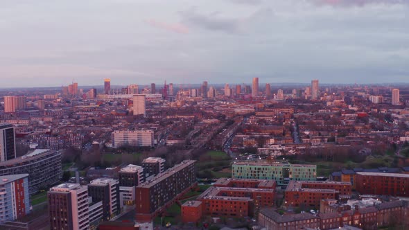 Aerial drone shot of London mile end looking towards stratford at sunset residential buildings alt