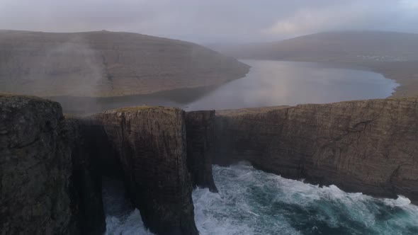 Drone Footage of Approaching Large Cliffs Next to Lake Sorvagsvatn in Faroe Islands