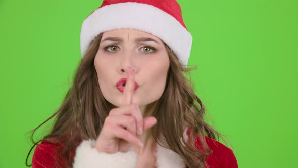Snow Maiden Points Her Finger a Little More Quietly. Green Screen. Close Up. Slow Motion alt