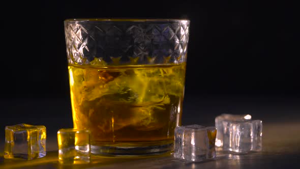 Whiskey in Glass with Cubes of Ice