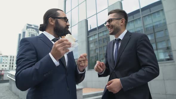 Man in Business Suit Feeling Pain in Stomach Eating Sandwich Outdoor Indigestion