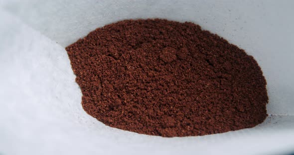 Coffee powder pouring in filter 4k