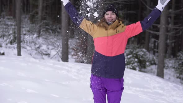 Winter Landscape Beautiful Snowfall Happy Woman Playing with Falling Snow alt