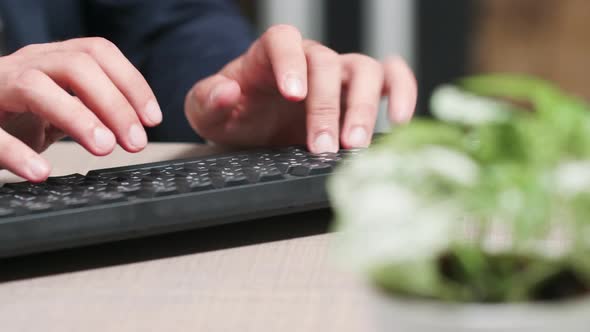 Dolly, Close Up Shot, of Businessman Hands Typing on Keyboard alt
