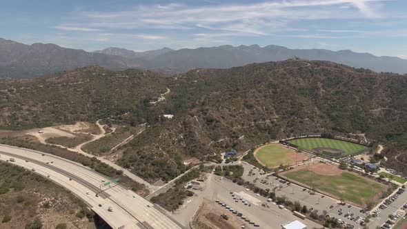 Aerial Shot of Soccer Fields Roads and Mountains in Glendale CA alt