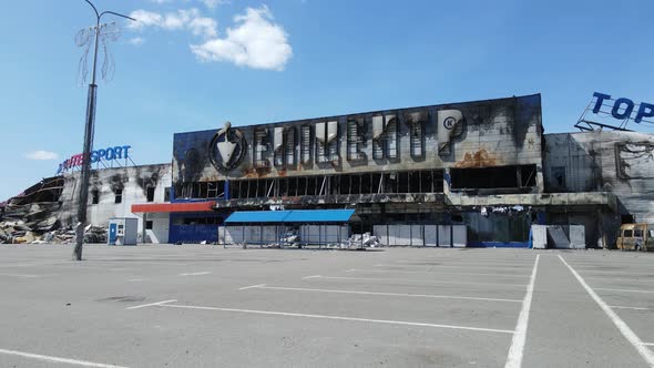 War in Ukraine  Destroyed Building of a Shopping Center in Bucha alt