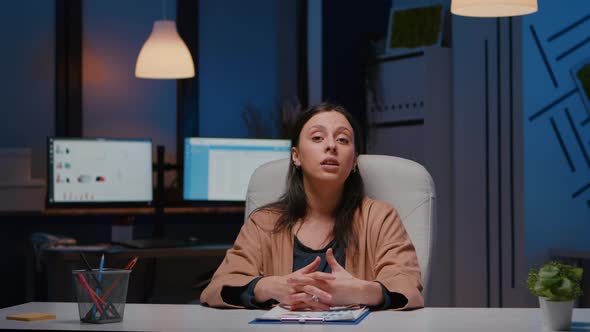 Pov of Tired Entrepreneur Woman Sitting at Desk Table Having Business Webinar alt