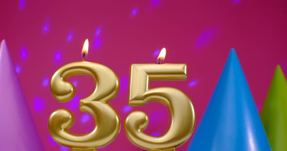 Burning Birthday Cake Candle Number 35