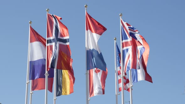 Silky fabrics of different nation  symbols on wind  4K 2160p 30fps UltraHD footage - Different flags alt