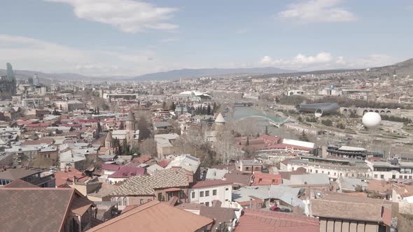 Aerial view of Tbilisi city central park and Bridge of Peace. Beautiful cityscape of old Tbilisi alt