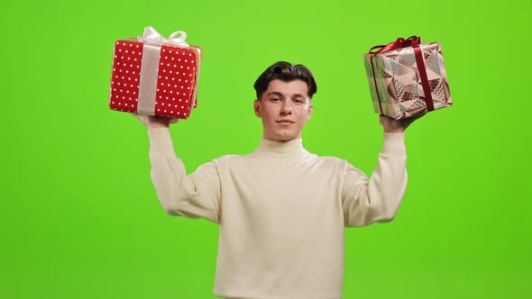 The Man is Standing and Looking at the Camera alt