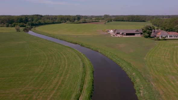 River Berkel in the Achterhoek flows through agricultural area, Gelderland, the Netherlands alt