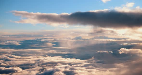 Clouds and Sky View From the Plane the Plane Flies High in the Sky Above the Clouds alt