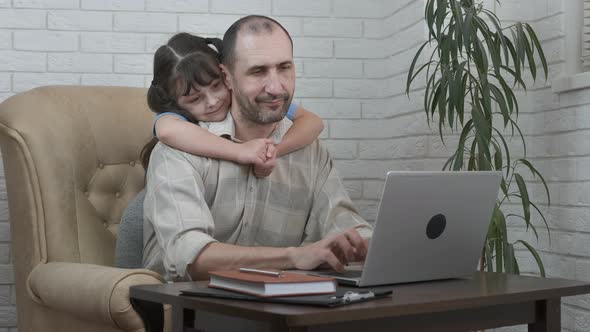 Home office with a child.  alt
