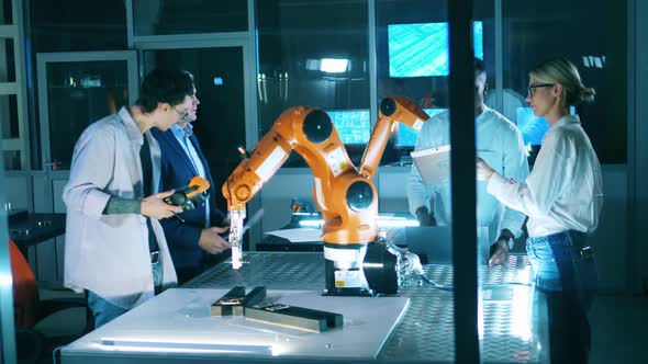 Researchers Are Analyzing Robotic Device Laboratory alt