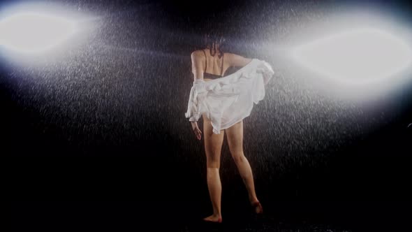 Hot Young Woman with Sexy Body Dancing Under the Rain Wearing Black Swimming Suit with Bright alt