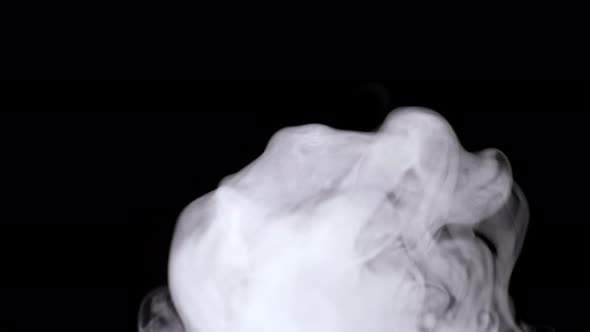 Thick Steam Cloud Vaporing Into Air From Humidifier alt