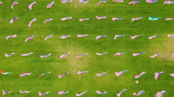 Waves of Flags Display at Pepperdine University in Malibu - aerial top down alt