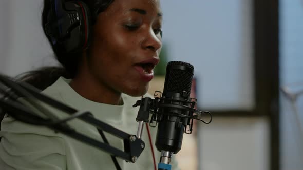 Close Up of Afro Woman Vlogger Making New Video Blog alt