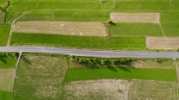 Aerial Drone Footage, Empty Road Between Fields