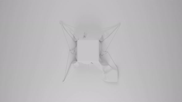 white fabric falls on a square that stands and disappears on a gray background