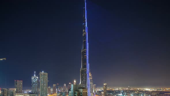 Dubai Downtown Cityscape with Burj Khalifa LightUp Light Show Aerial Timelapse alt