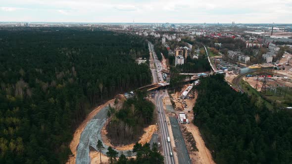 Pan Right Over Large Bridge Construction Site in Latvia alt