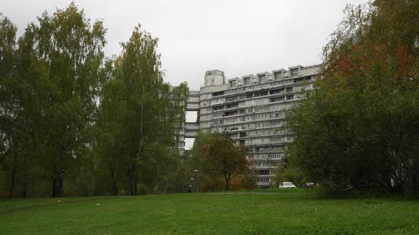 Highrise Residential Building and Autumn Landscape