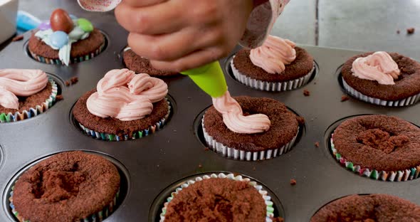 Girl making cupcakes