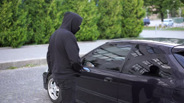 Car Jacking Thief Steal Car Breaking Door Criminal Job Burglar Hijacks Auto Thief Black Balaclava alt