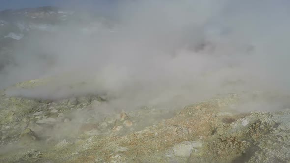 Swirling Steam Emission from Volcanic Hot Springs on Geothermal Field