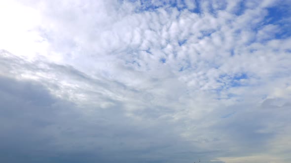 Time lapse of white cloud moving pass around sky background alt