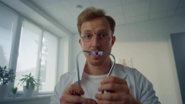 Doctor Wearing Stethoscope Checking Patient Lungs in Modern Clinic Pov Video alt